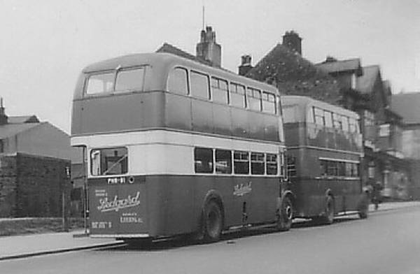 1940+1952 Leyland Titans. At the rear is PNW91, a 1952 PD2-12, while leading the way is JNW288, a 1940 TD7 lgpnw91