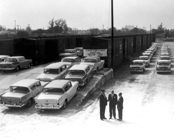 1958 Train unloading 1958 Ramblers for a car rental company in Florida.
