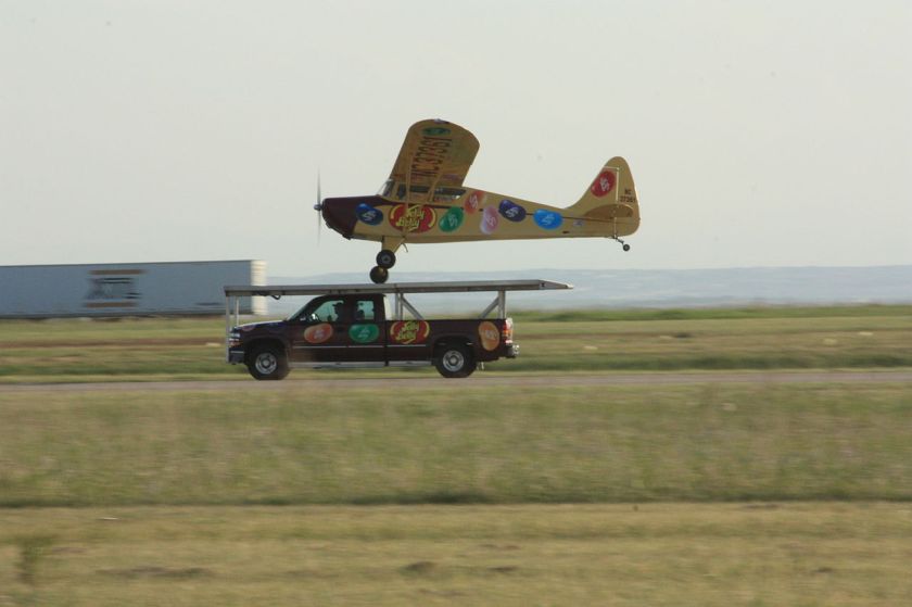 Landing_an_airplane_on_a_Chevrolet_Silverado_in_Airdrie,_Alberta